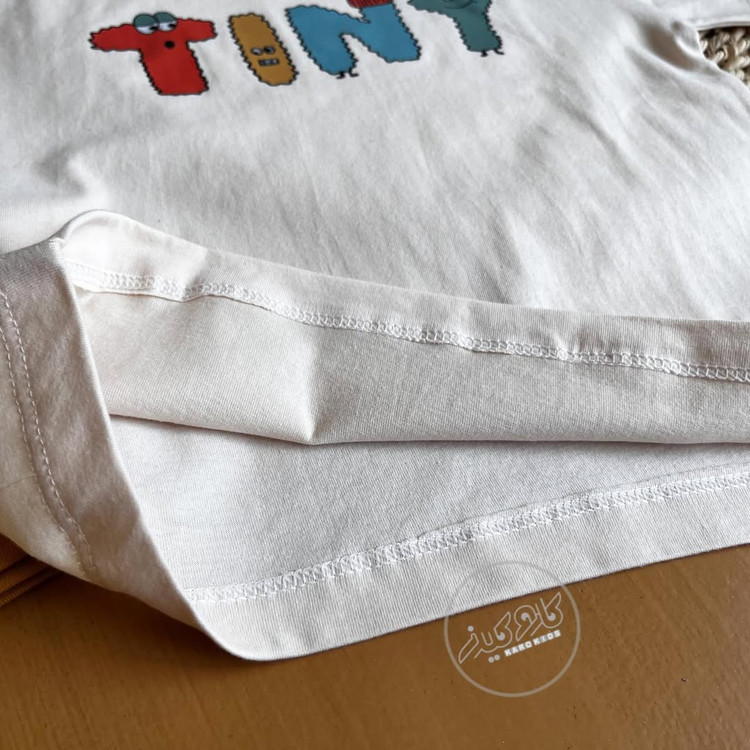 عکس جزئیات ست تیشرت شلوارک دخترانه طرح tiny