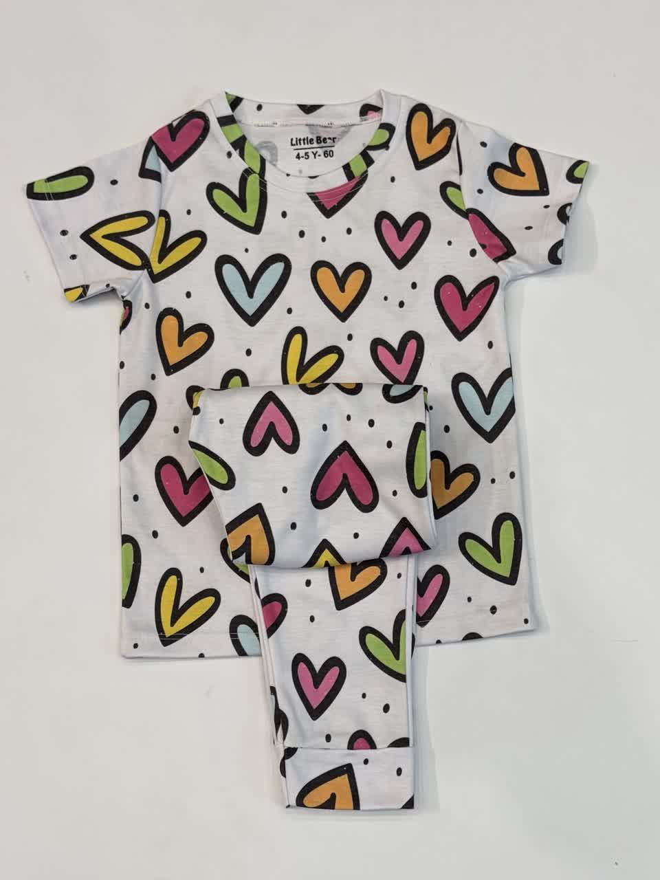 ست تیشرت و شلوار راحتی دخترانه صورتی رنگ طرح قلب | سایز 3 تا 8 سال
